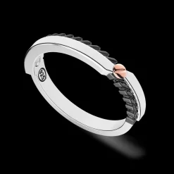 Anello a fede Zancan in argento e vite in oro rosa.