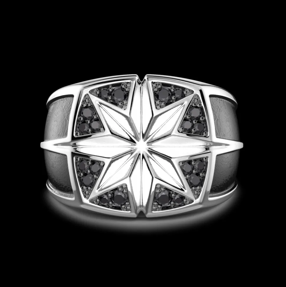 Anello Zancan in argento con rosa dei venti incisa e pietre nere.
