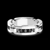 Anello Zancan in argento a fede con pietre nere.