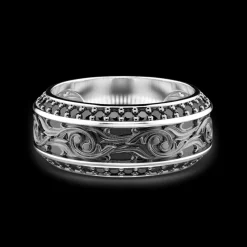 Anello Zancan in argento a fede con pietre nere.