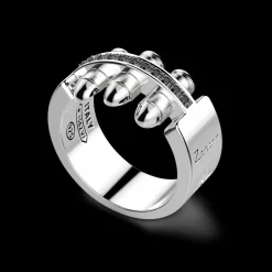 Anello Zancan in argento a proiettili con pietre nere.