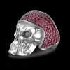 Anello Zancan in argento a teschio con pietre rosse.