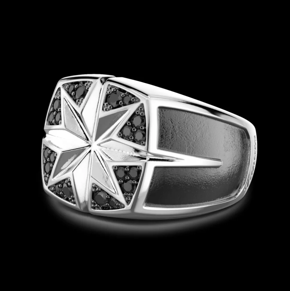 Anello Zancan in argento con rosa dei venti incisa e pietre nere.