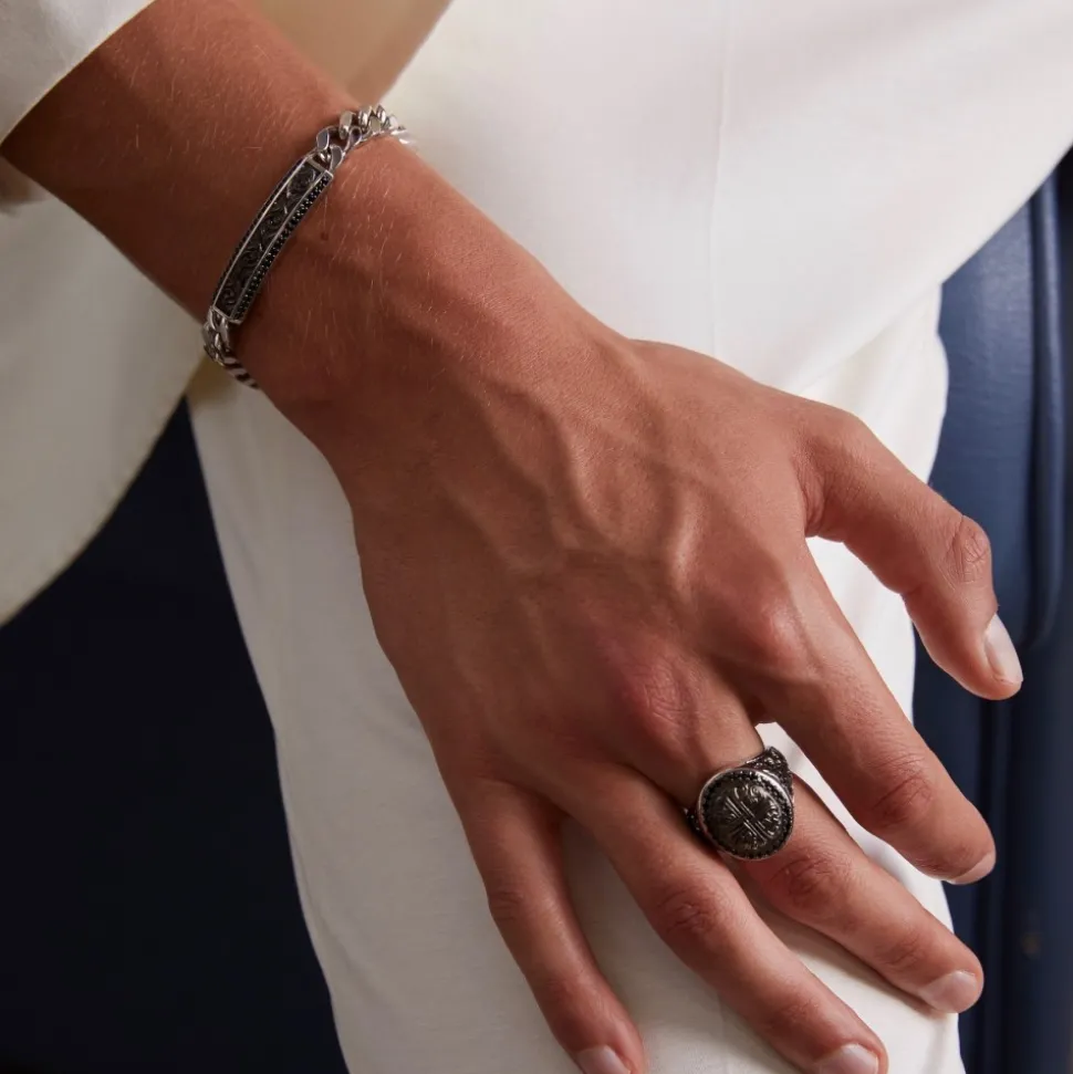 Bracciale Zancan in argento a grumetta con targa e pietre nere.