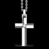 Collana Zancan in argento con pendente a croce e vite in oro rosa.