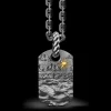 Collana Zancan in argento brunito con pendente raffigurante le onde del mare.