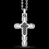 Collana Zancan in argento con pendente a croce e pietre nere.