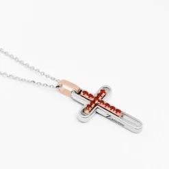 Collana zancan in oro con croce e rubini.