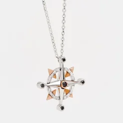 Collana zancan in oro con pendente rosa dei venti e diamanti.