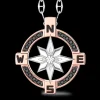 Collana  zancan in oro con pendente rosa dei venti e diamanti.