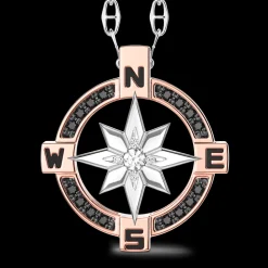 Collana  zancan in oro con pendente rosa dei venti e diamanti.