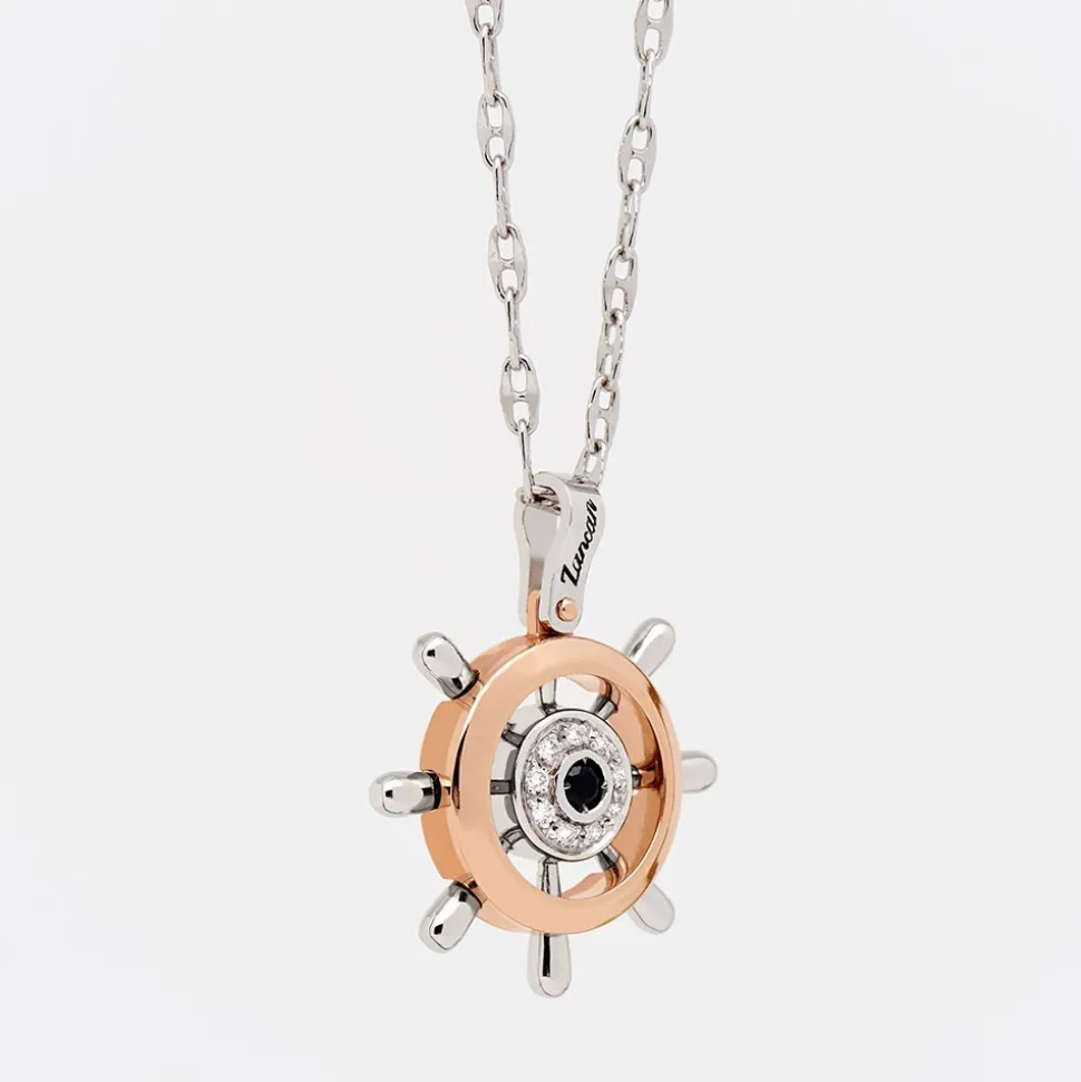Collana zancan in oro con pendente timone e diamanti.