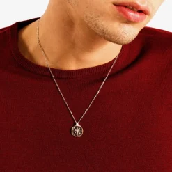 Collana  zancan in oro con pendente rosa dei venti e diamanti.