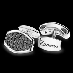 Gemelli Zancan in argento con pietre nere.