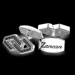 Gemelli Zancan in argento con pietre nere.