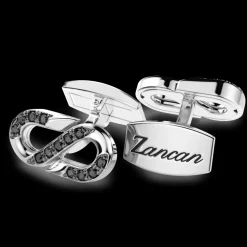 Gemelli Zancan in argento con pietre nere.