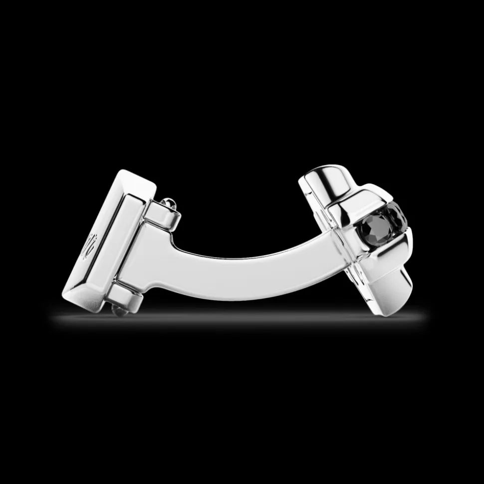 Gemelli Zancan in argento con pietre nere.